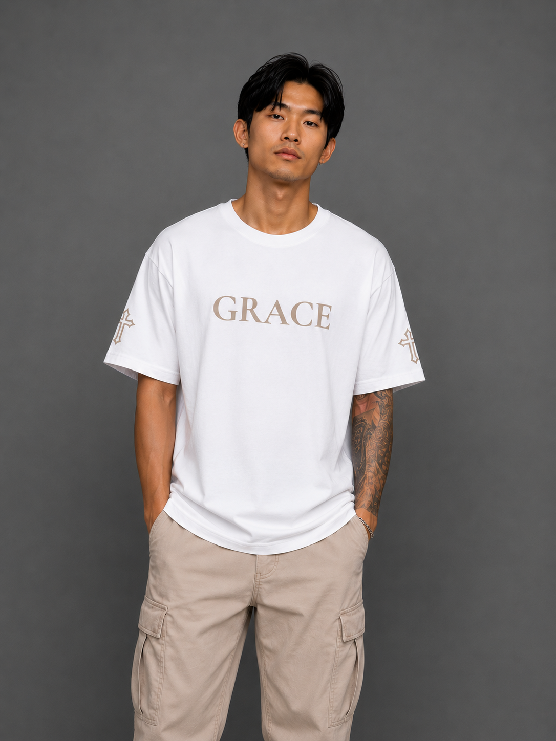 Front view of white Grace T-shirt from the Soul Kreations Luxe Promise Collection featuring embroidered Grace lettering and cross sleeve details. ✨