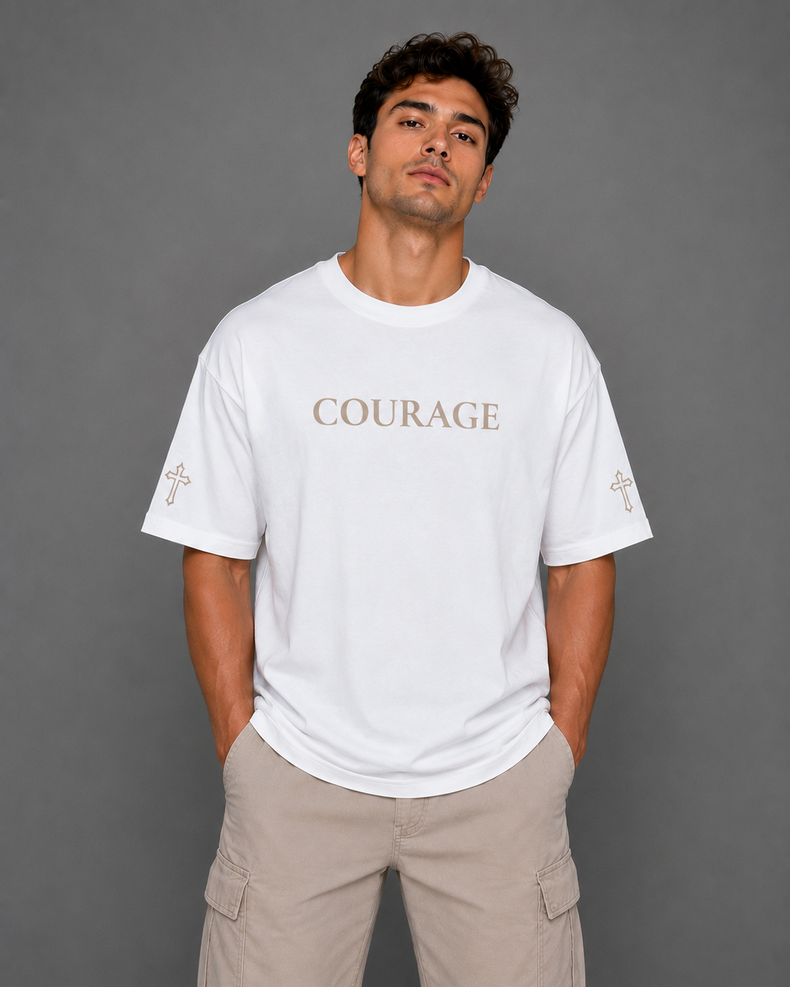 Front view of white Courage T-shirt from the Soul Kreations Luxe Promise Collection featuring embroidered Courage lettering and cross sleeve details. ✨