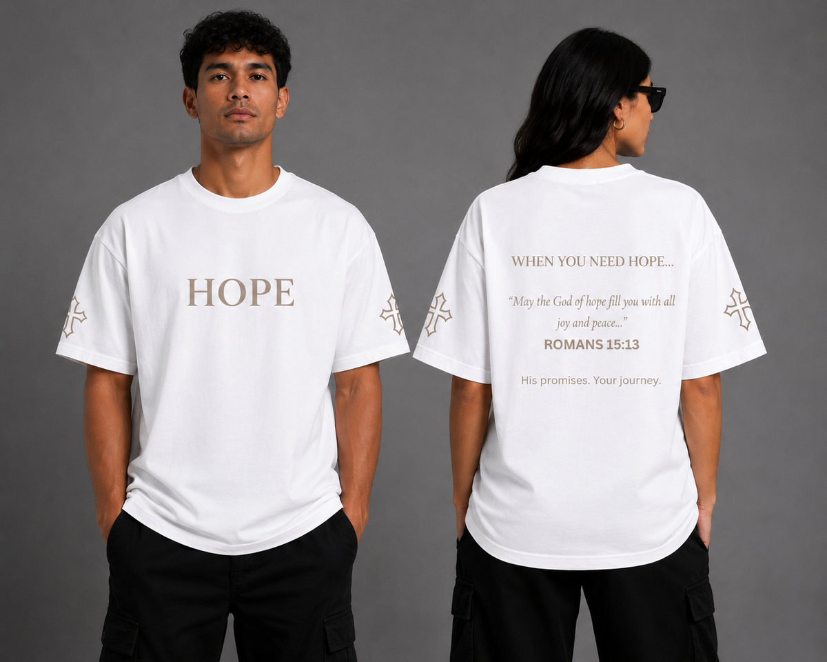 Male and female models wearing white Hope T-shirts from the Soul Kreations Luxe Promise Collection, showing embroidered HOPE chest and cross sleeve details with Romans 15:13 scripture printed on the back.
