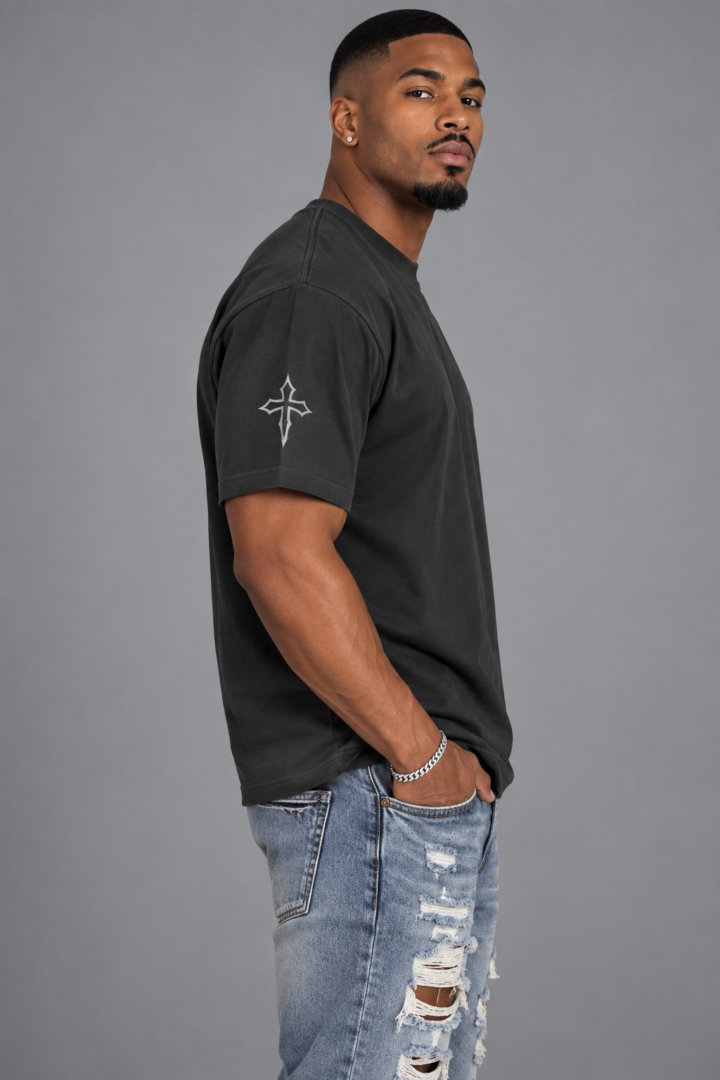 Male model wearing The Way, The Truth, The Life charcoal smoke T-shirt with John 14:6 side graphic.