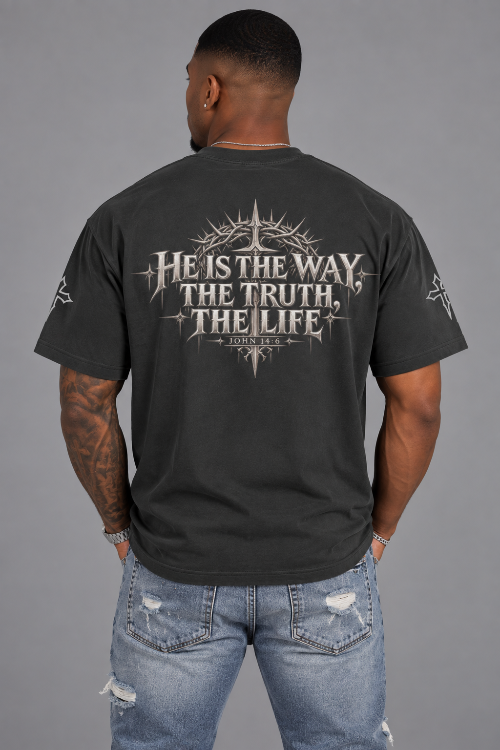 Male model wearing The Way, The Truth, The Life charcoal smoke T-shirt with John 14:6 back graphic.